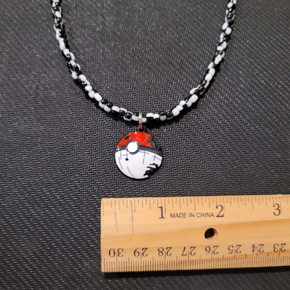 Red and Black Beaded Necklace with Poké Ball Pendant - Picture 4 of 5